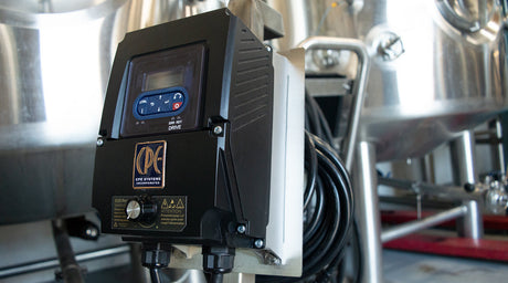 How does using a variable speed drive reduce energy consumption and cost?